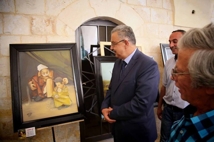 معرض فني يجسد معاناة الفلسطيني وحنينه لأرضه