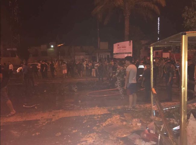 11 قتيلا وعشرات الجرحى بتفجير وسط بغداد (فيديو-صور)