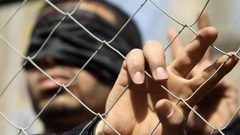 أسير يدخل عامه الرابع عشر