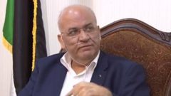 بعد رحلة علاج ...عريقات يعود إلى أريحا