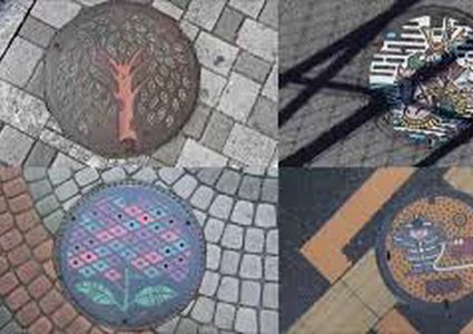 يابانيون يحولون "أغطية التصريف" لأعمال فنية