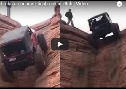 سيارة جيب تتحدى الجاذبية وتسير رأسياً على قمة جبل
