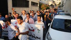 قلقيلية: وقفة احتجاج ضد تقليص خدمات الأونروا للاجئين