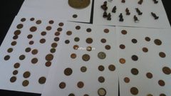 الشرطة تقبض على شخصين بحوزتهما 90 عملة أثرية