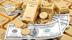 الذهب يرتفع وتعافي الدولار يقيد مكاسبه