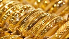 تراجع الذهب مع صعود الدولار بعد رفع الفائدة الأمريكية