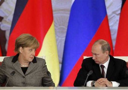 بوتين وميركل يتناولا الملف السوري