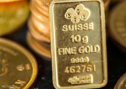 الذهب يحوم فوق 1200 دولار