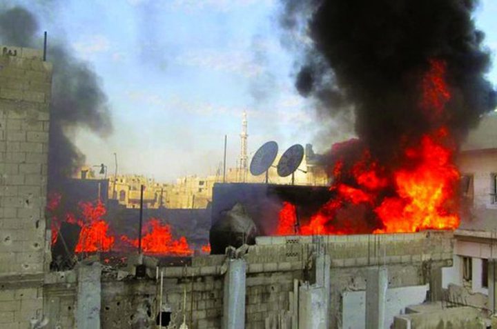 مستوطنون يضرمون النار بمعدات بناء جنوب نابلس