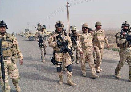 القوات العراقية تفكك 103 عبوات ناسفة