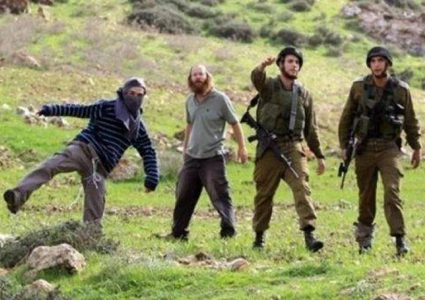 مستوطنون يهاجمون المزارعين في قرية بورين