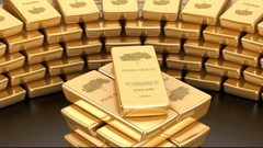 الذهب يهبط مع صعود الدولار واستقرار "الفائدة"