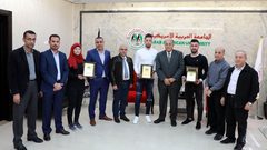 تكريم لاعبي "الأمريكية" المشاركين ببطولات دولية