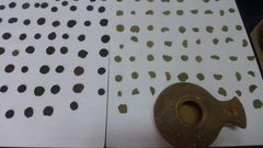 الشرطة تضبط 32 قطعة معدنية وفخاريه اثرية