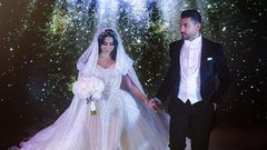 بالصور:ملكة جمال تبهر العالم بزفافها الفخم وفستانها المميز