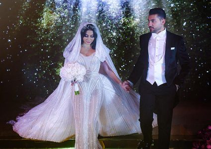 بالصور:ملكة جمال تبهر العالم بزفافها الفخم وفستانها المميز