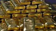 الذهب ينهي الجلسة مستقرا بعد أن سجل أعلى مستوى