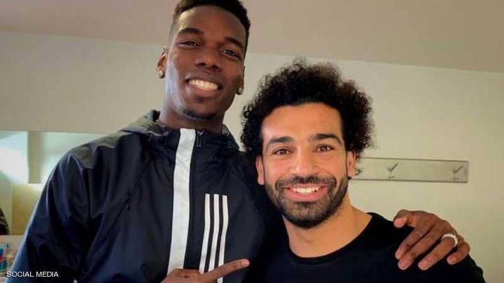 مطالبات بحظر صفحة محمد صلاح وحذف صورته مع بوغبا