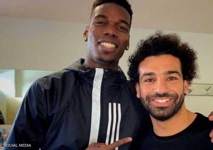 مطالبات بحظر صفحة محمد صلاح وحذف صورته مع بوغبا
