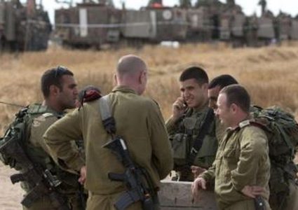 اسرائيل تعزز قواتها  مع استمرار بناء العائق العلوي