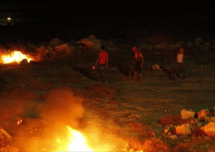 أهالي قرية المغير برام الله يصدون هجوماً للمستوطنين