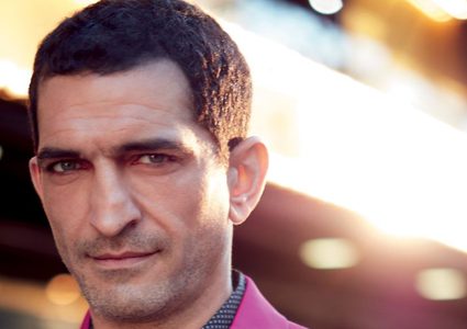 واكد مهدد بالقبض عليه حال عودته إلى مصر