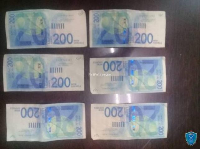 القبض على شخصين بحوزتهما 1600 شيكل من فئة 200 شيكل مزورة