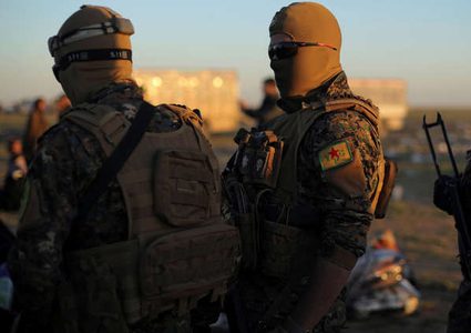 400 عنصر من داعش يسلمون أنفسهم شرق دير الزور