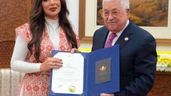 الرئيس عباس يكرم الأردنية هدى حمدان عن "خيانة وطن"