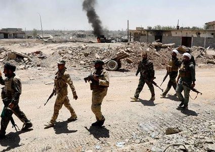 العثور على مقبرة جماعية تضم رفات عشرات الموظفين بالعراق