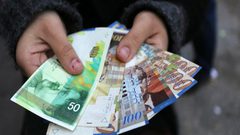 أسعار صرف الدولار والدينار مقابل الشيكل