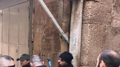 اعتقال أحد حراس الأقصى بعد الاعتداء عليه بشكل مبرح