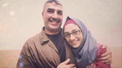 عزل أسير أحرق علم الاحتلال