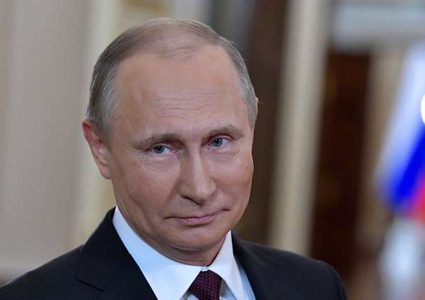 بوتين يحتسي الشاي مع زوجين وأطفالهما التسعة!