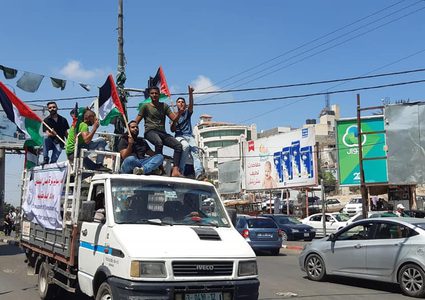 مسيرة شاحنات في غزة رفضا للحصار