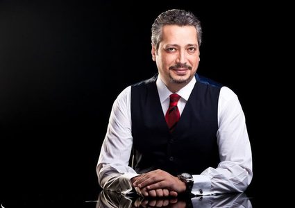 منع تامر أمين من ممارسة الإعلام