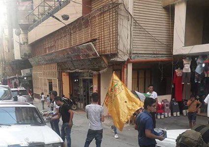 توزيع حلوى واطلاق نار في مخيم البداوي احتفالا بعملية"حزب الله"