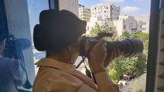 " حنان سعادة "  مصورة طيور فلسطينية .. ترصد وتصور وتوثق