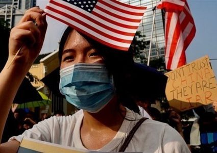 متظاهرون هونج كونج يطالبون بالضغط على الصين