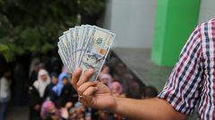 بالأسماء: العائلات المستفيدة من المنحة القطرية الـ100$ بقطاع غزة