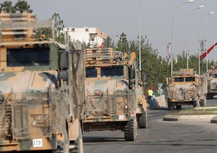 فرنسا وألمانيا تعلقان بيع الأسلحة لتركيا