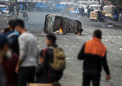 إصابة ضابط عراقي بقنبلة يدوية وتوترات وسط بغداد