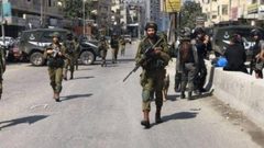 إصابات بالاختناق عقب اقتحام الاحتلال قرية دير نظام