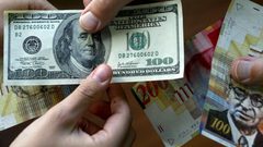 خبير اقتصادي يتوقع بأن يستمر هبوط الشيكل مقابل الدولار