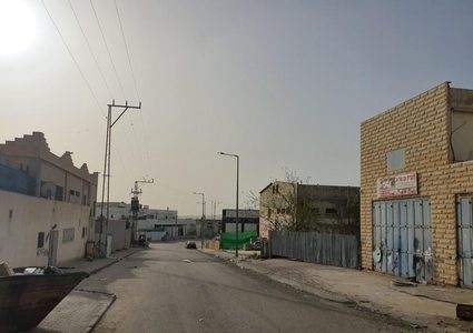 إجراء فحوصات للكشف عن مصابين محتملين بكورونا في ام الفحم