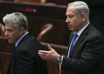 لبيد يبدي استعداده للتعاون مع نتنياهو لمنع غانتس من رئاسة الحكومة