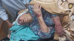 استنكار واسع لاعتداء عناصر حماس على ام جبر وشاح