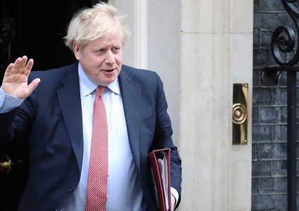 جونسون يدعو لمواجهة التباطؤ الاقتصادي بسبب كورونا