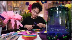 فن طي الورق يزهر ورداً بأنامل صغيرة