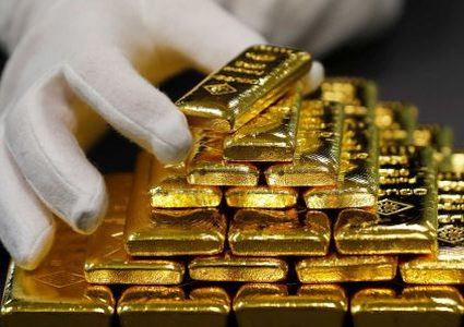 الذهب يقلص مكاسبه بعد صعود قياسي